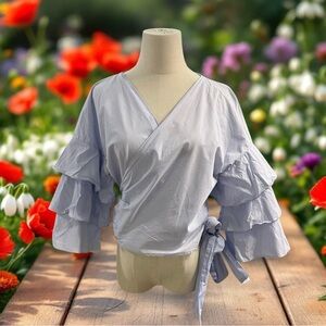 Zara Wrap Blouse. 3/4 Ruffled Sleeve
Size: Large Soft Baby Blue